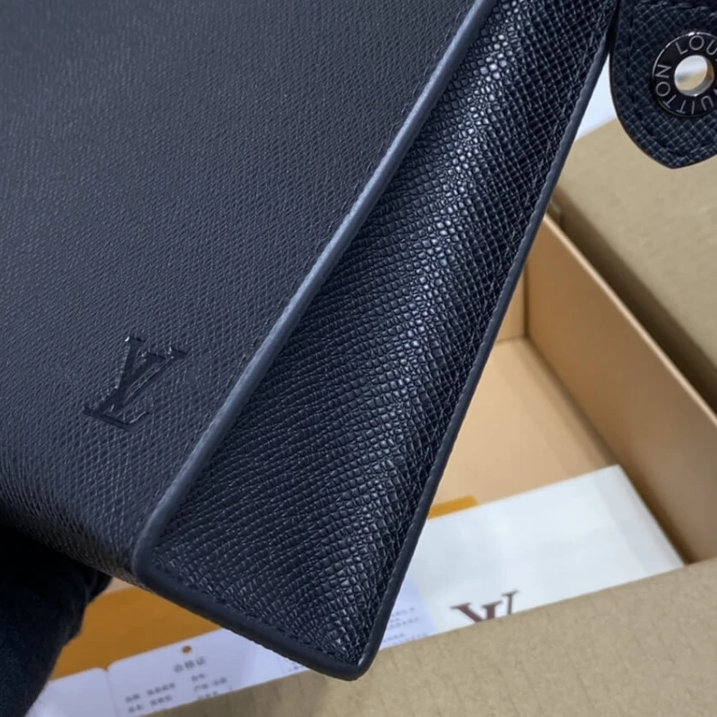Replica bag Textile l Louis Vuitton Taiga leather Pochette Voyage MM Black