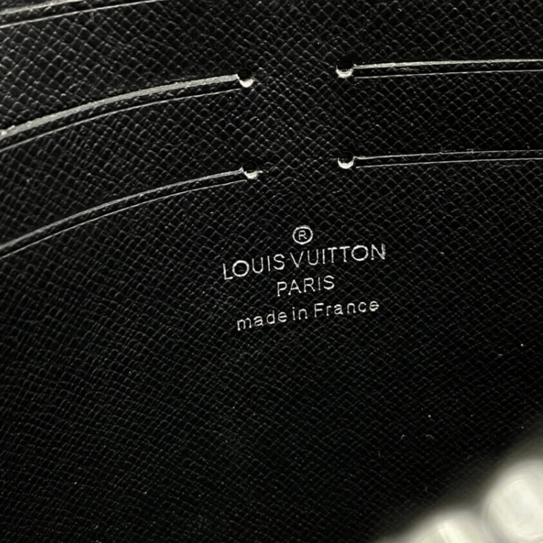 Replica bag Textile l Louis Vuitton Taiga leather Pochette Voyage MM Black
