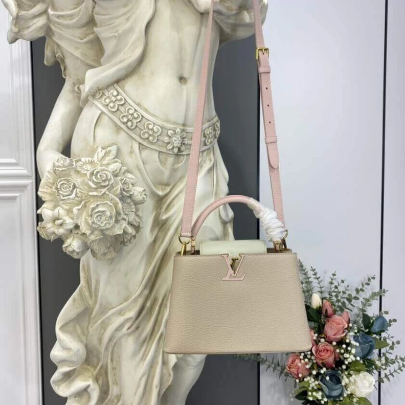 Replica bags lv For Fall 2 Louis Vuitton Taurillon Leather Capucines BB Galet