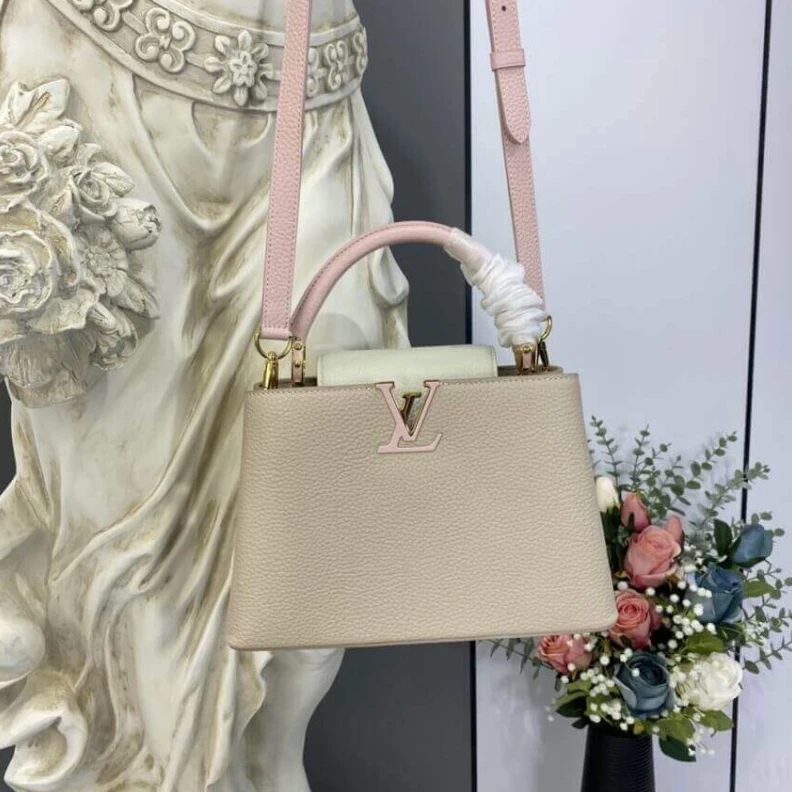 Replica bags lv For Fall 2 Louis Vuitton Taurillon Leather Capucines BB Galet