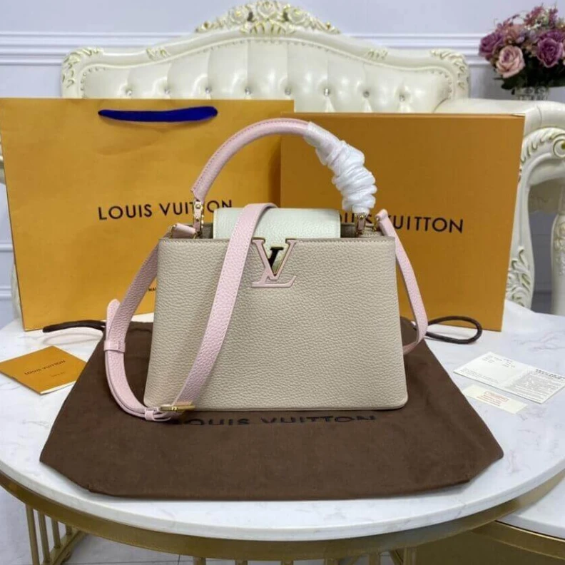 Replica bags lv For Fall 2 Louis Vuitton Taurillon Leather Capucines BB Galet