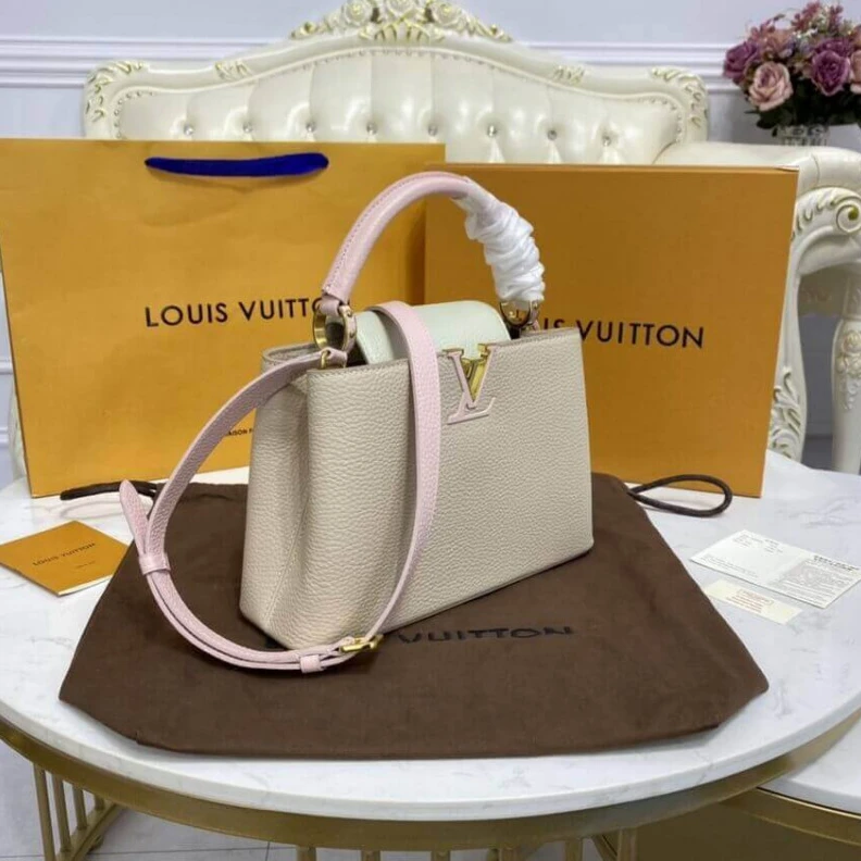 Replica bags lv For Fall 2 Louis Vuitton Taurillon Leather Capucines BB Galet