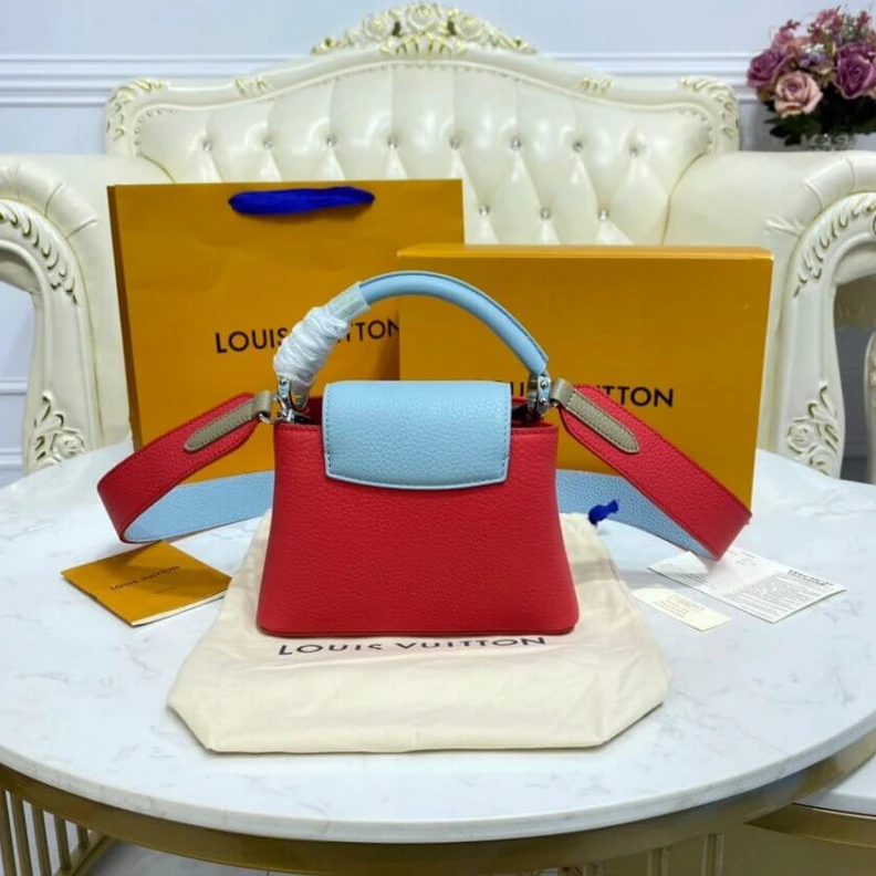 Mythick Snap hook Louis Vuitton Taurillon Leather Capucines Mini Coral Olympe Blue