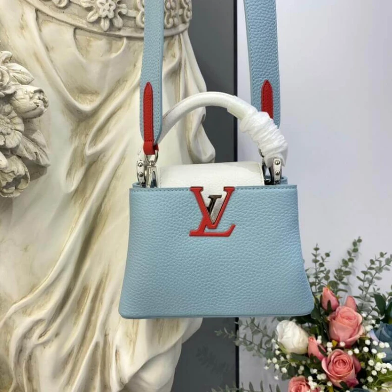 Lv belts replica Louis Vuitton Taurillon Leather Capucines Mini Olympe Blue White