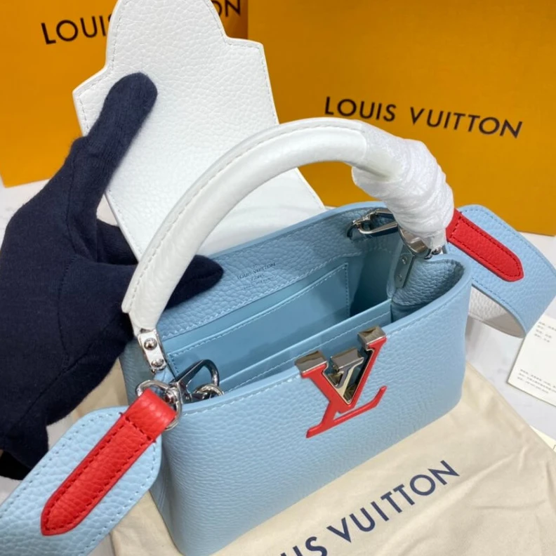 Lv belts replica Louis Vuitton Taurillon Leather Capucines Mini Olympe Blue White
