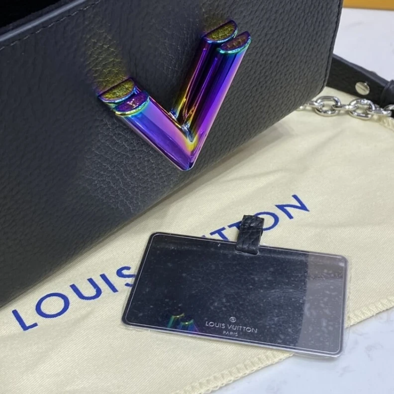 Lv belts replica This Twist Louis Vuitton Taurillon Leather Twist Mini