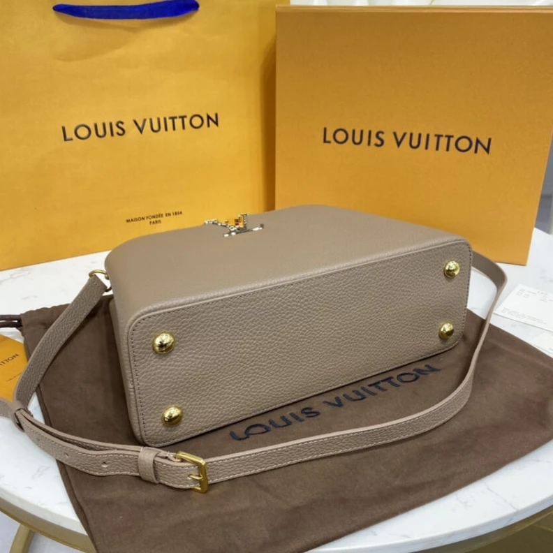 Replica bag Taurillon Louis Vuitton Taurillon Leather and Python Capucines MM