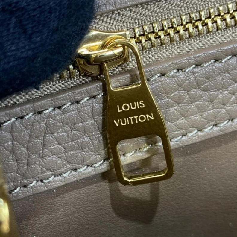 Replica bag Taurillon Louis Vuitton Taurillon Leather and Python Capucines MM