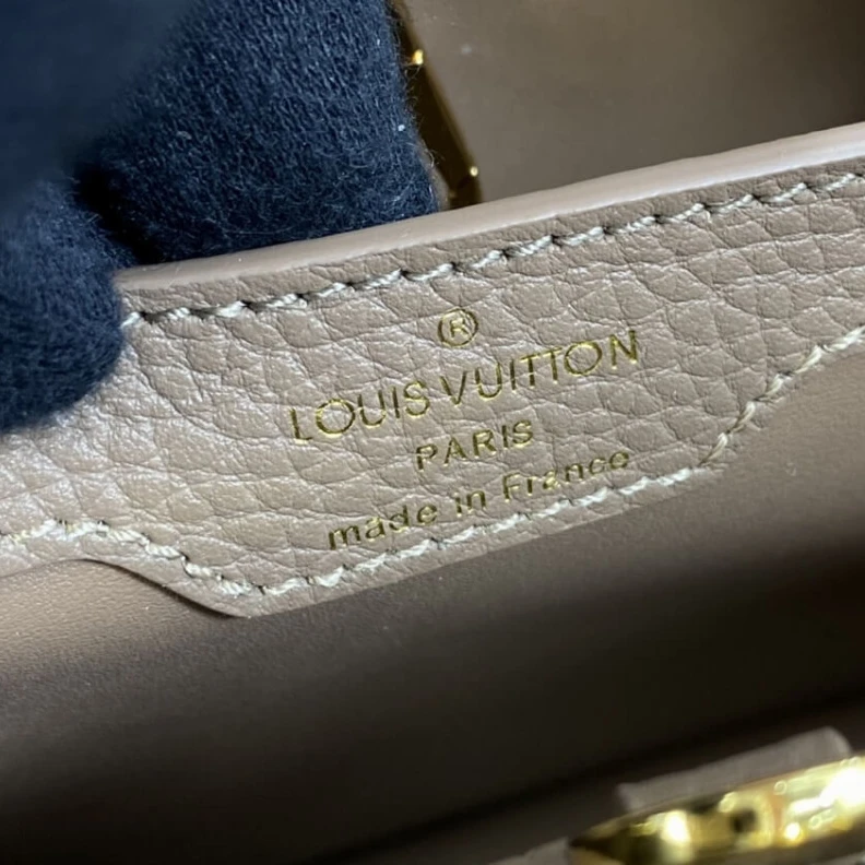 Replica bag Taurillon Louis Vuitton Taurillon Leather and Python Capucines MM
