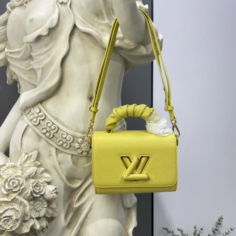 Lv belts replica Microfibe Louis Vuitton Taurillon Leather and Smooth Calfskin Twist PM Yellow