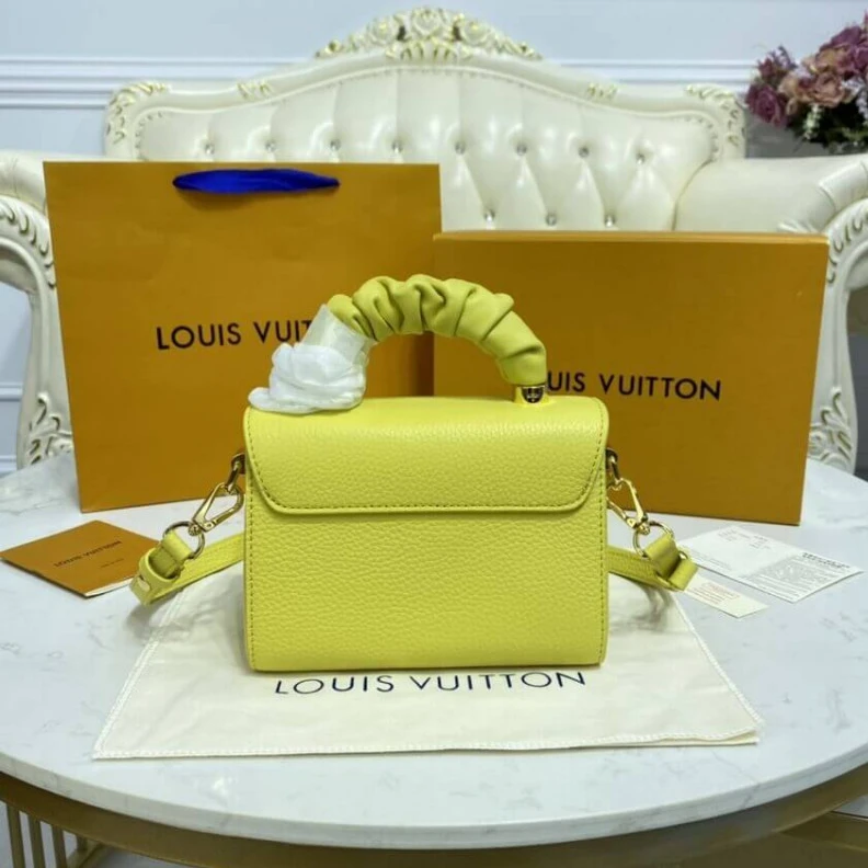 Lv belts replica Microfibe Louis Vuitton Taurillon Leather and Smooth Calfskin Twist PM Yellow