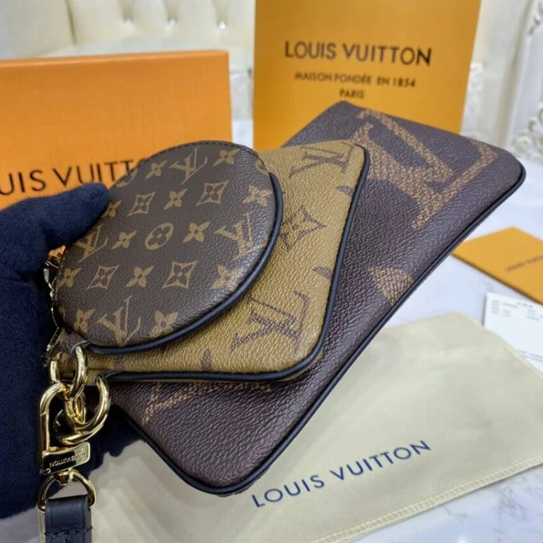 Lv belts replica Cowhidele Louis Vuitton Trio Pouch