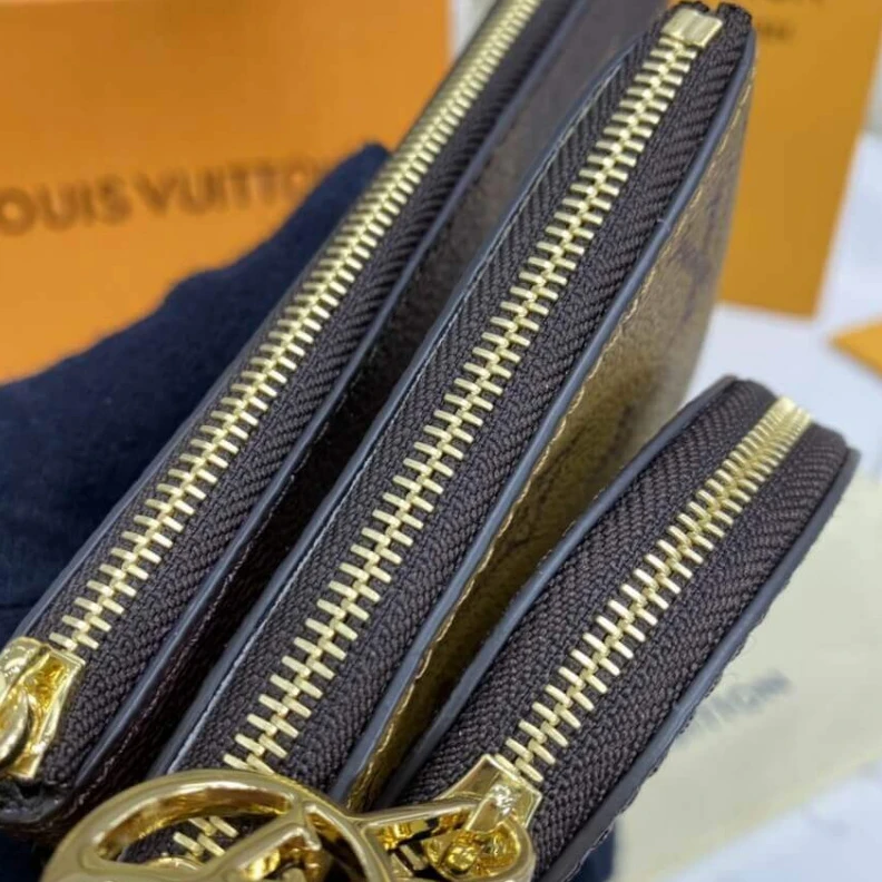 Lv belts replica Cowhidele Louis Vuitton Trio Pouch