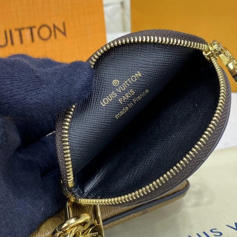 Lv belts replica Cowhidele Louis Vuitton Trio Pouch