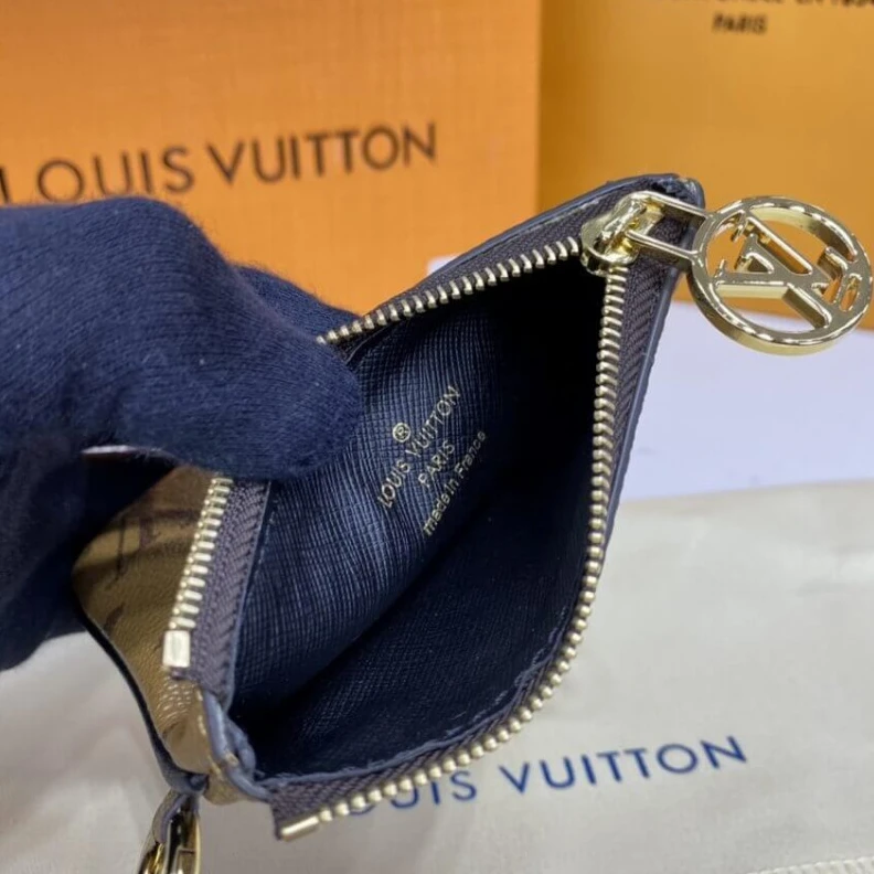 Lv belts replica Cowhidele Louis Vuitton Trio Pouch