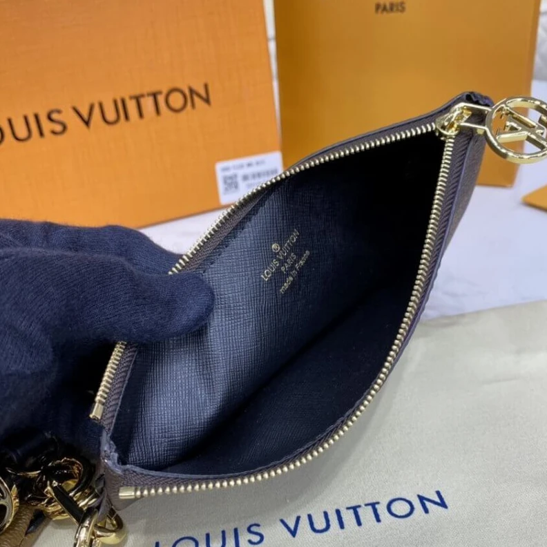 Lv belts replica Cowhidele Louis Vuitton Trio Pouch