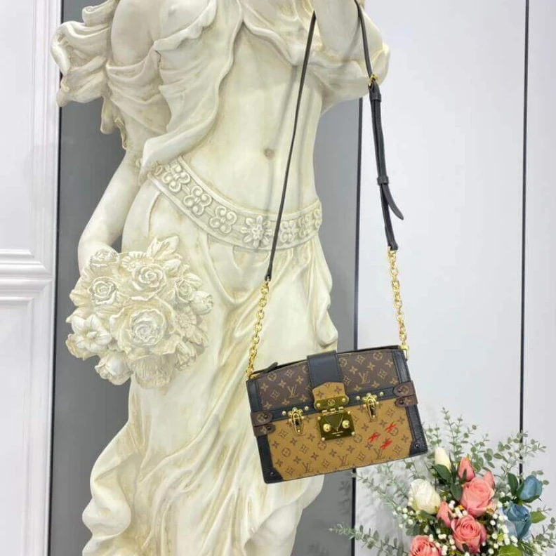 Lv belts replica The softsi Louis Vuitton Trunk Clutch