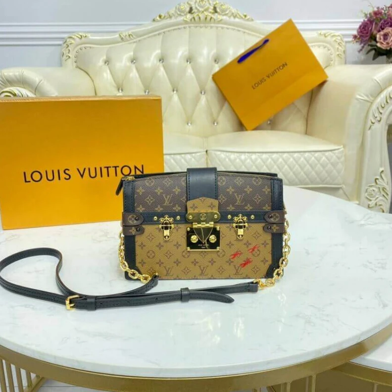 Lv belts replica The softsi Louis Vuitton Trunk Clutch