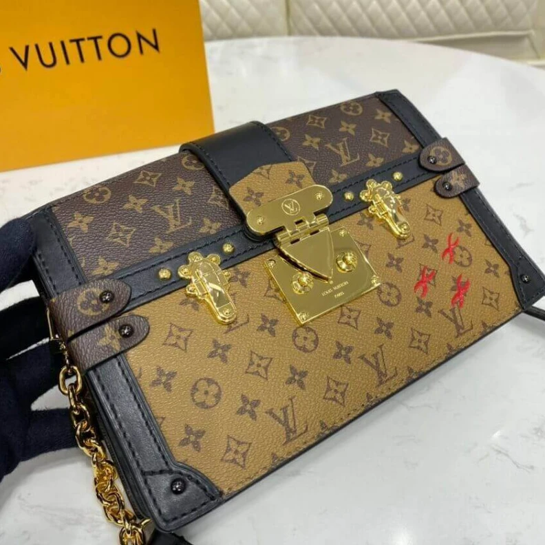 Lv belts replica The softsi Louis Vuitton Trunk Clutch