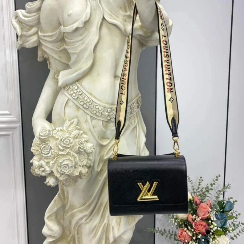 Replica bags Inside fl Louis Vuitton Twist MM