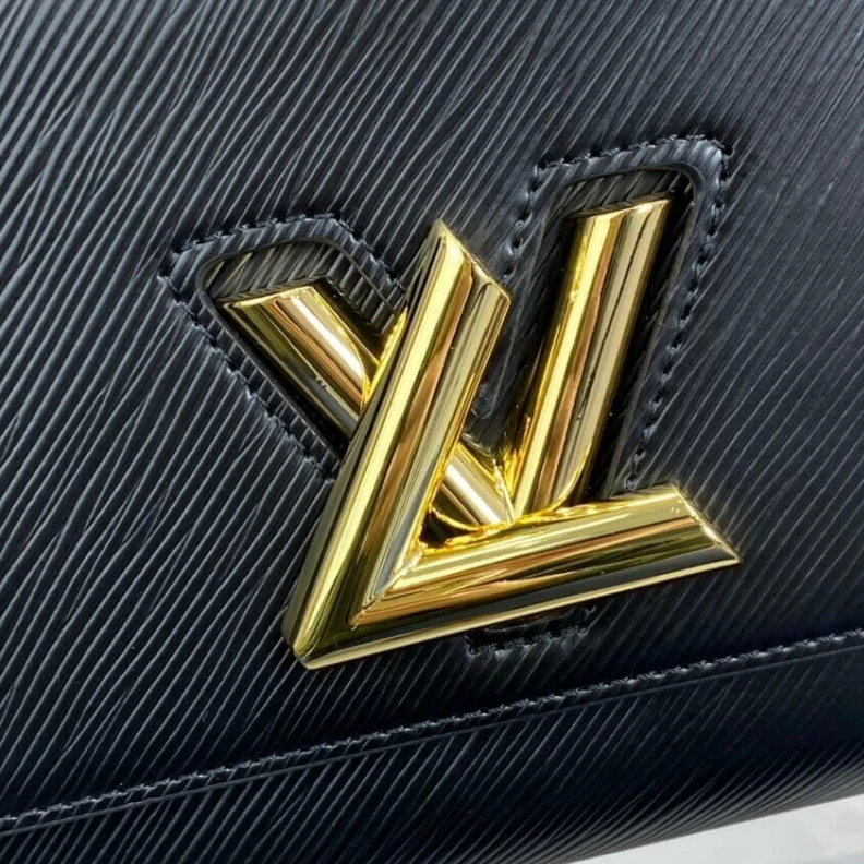 Replica bags Inside fl Louis Vuitton Twist MM