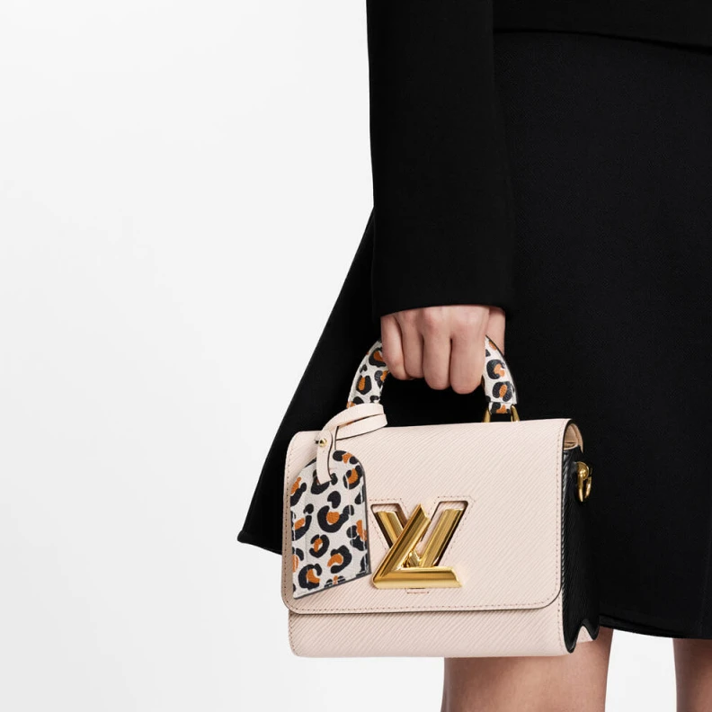 Handle: S Louis Vuitton Twist PM Quartz