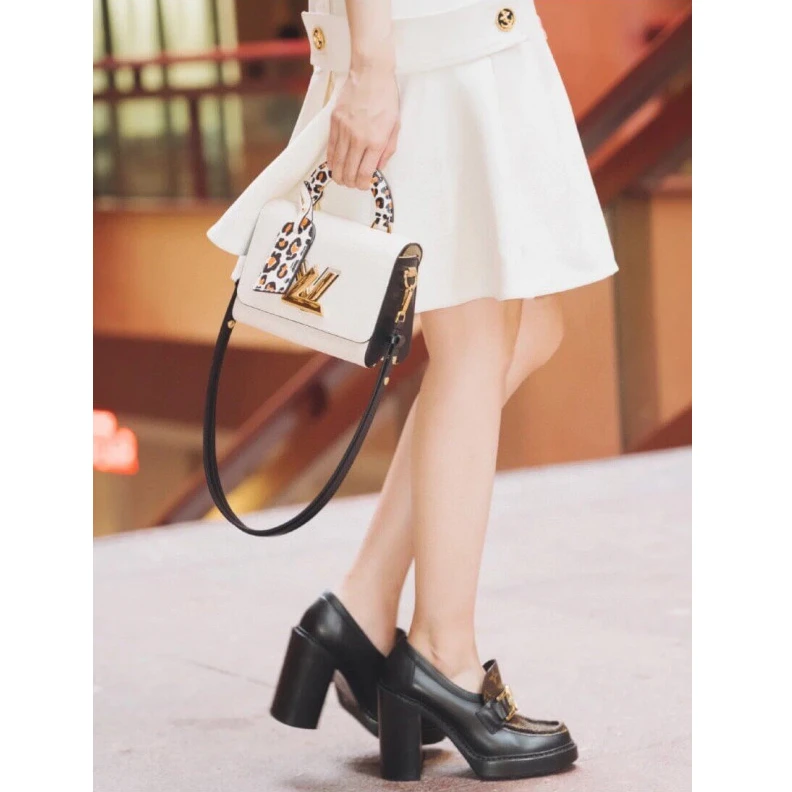 Handle: S Louis Vuitton Twist PM Quartz