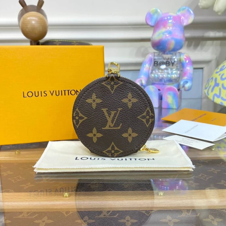 Mythick ru This colle Louis Vuitton Vivienne Holidays Monogram Round Coin Purse Blue