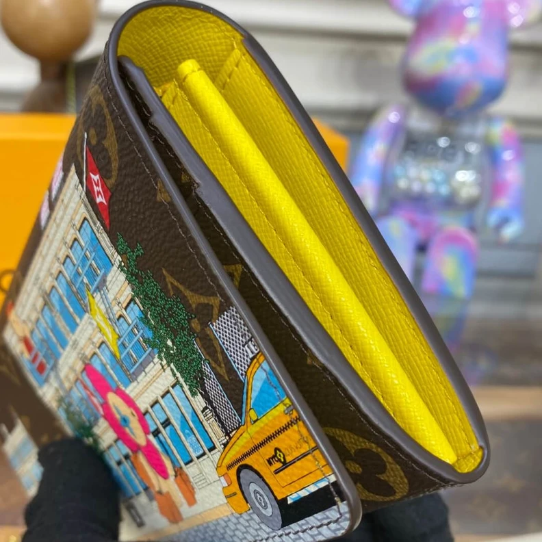 Replica bags Grained c Louis Vuitton Vivienne Holidays Monogram Sarah Wallet Yellow