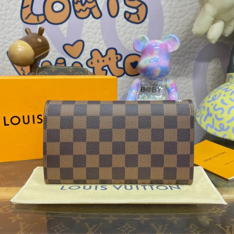 Replica bags Outside f Louis Vuitton Vivienne Sailing Damier Ebene Sarah Wallet Pink