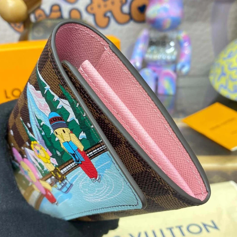 Replica bags Outside f Louis Vuitton Vivienne Sailing Damier Ebene Sarah Wallet Pink
