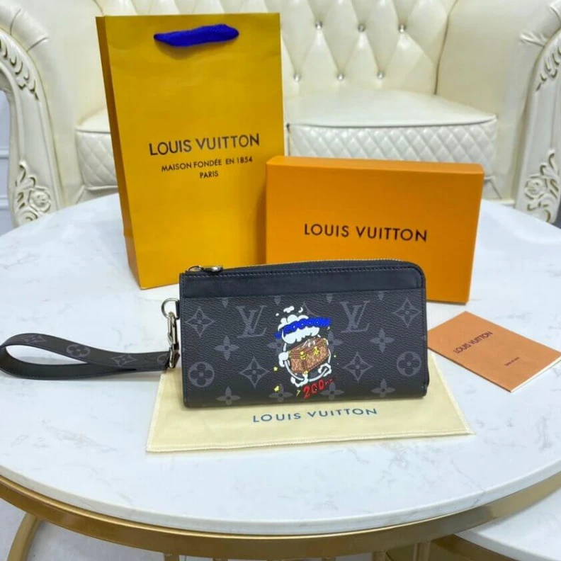 Cowhidele Louis Vuitton Zippy Dragonne