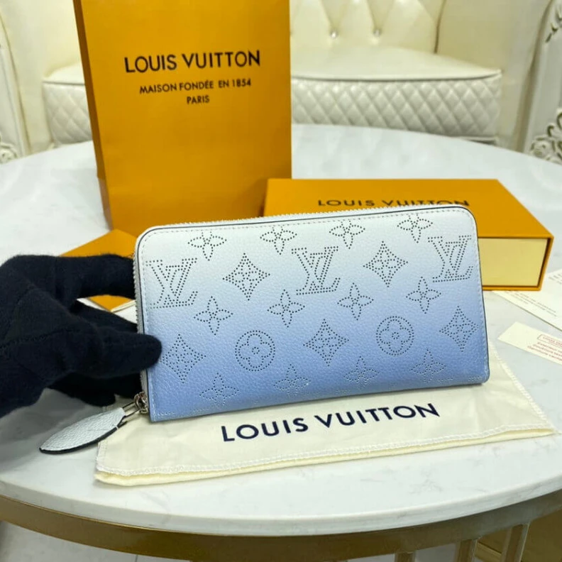 Lv belts replica Silvercol Louis Vuitton Zippy Wallet in Blue Gradient Mahina Perforated Leather