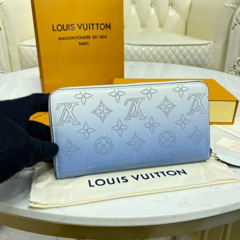 Lv belts replica Silvercol Louis Vuitton Zippy Wallet in Blue Gradient Mahina Perforated Leather