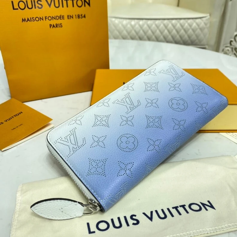 Lv belts replica Silvercol Louis Vuitton Zippy Wallet in Blue Gradient Mahina Perforated Leather
