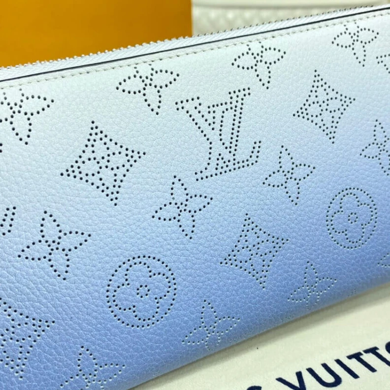 Lv belts replica Silvercol Louis Vuitton Zippy Wallet in Blue Gradient Mahina Perforated Leather