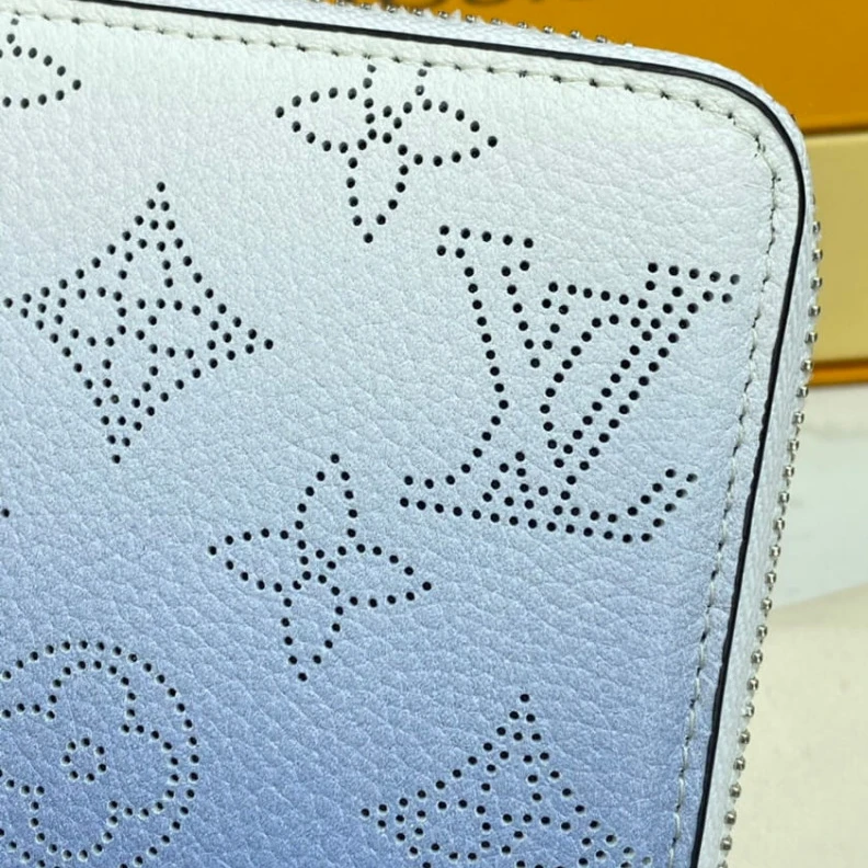 Lv belts replica Silvercol Louis Vuitton Zippy Wallet in Blue Gradient Mahina Perforated Leather