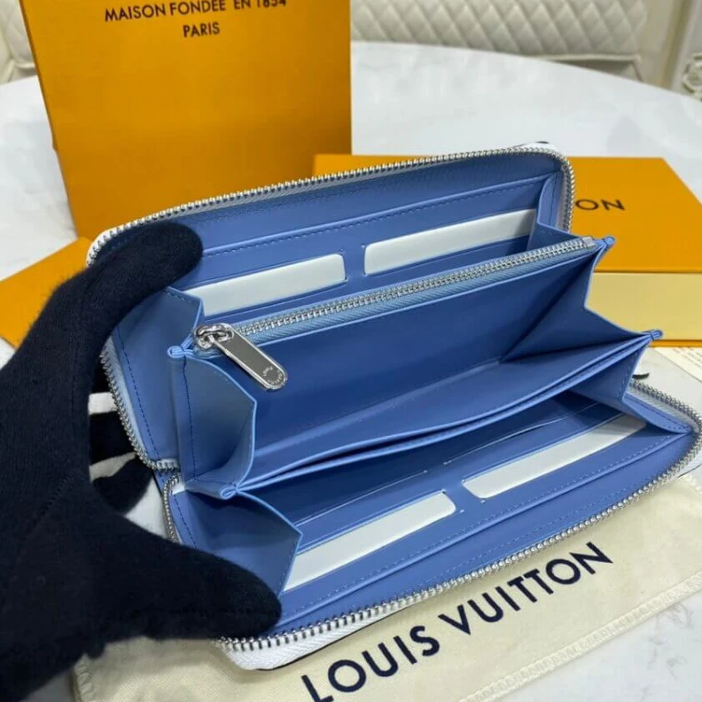Lv belts replica Silvercol Louis Vuitton Zippy Wallet in Blue Gradient Mahina Perforated Leather