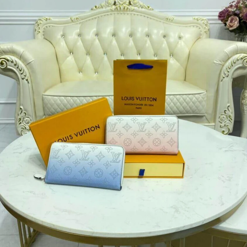 Lv belts replica Silvercol Louis Vuitton Zippy Wallet in Blue Gradient Mahina Perforated Leather