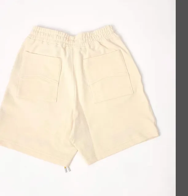 RHUDE x MCLAREN Co branded Letter Logo Embroidered Drawstring Shorts Apricot S-XL