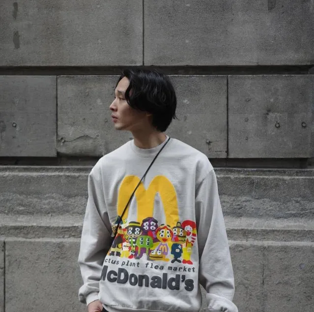 CACTUS PLANT FLEA x MCDONALD'S CACTUS BUDDY AND FRIENDS CREWNECK McDonald's Co branded Logo Four Eyed Smiling Face Burger Family Letter Logo Haircoat Hoodie