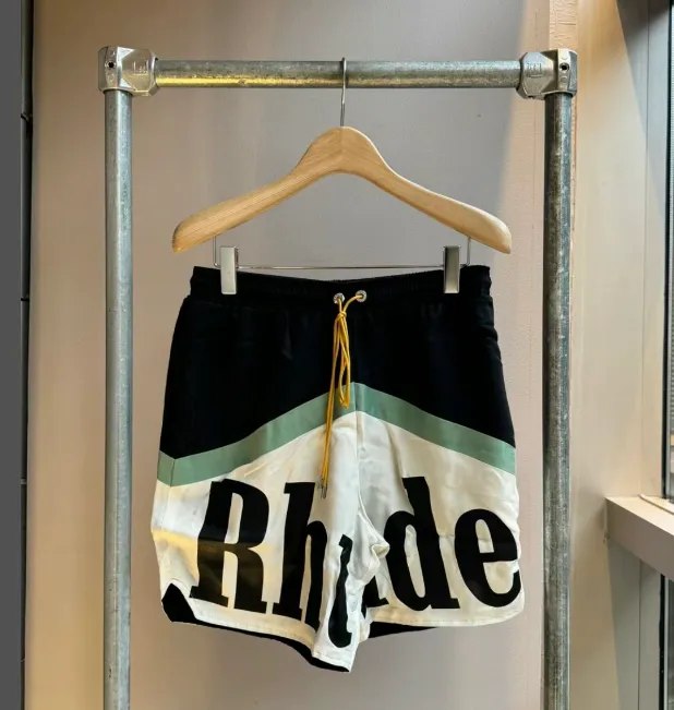 RHUDE Large Letter Logo Splicing Drawstring Shorts Black and White Color Splicing S-XL