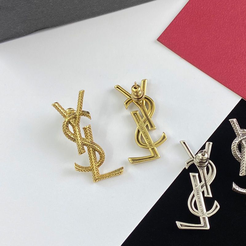 Saint Laurent Opyum Earrings In Snake Metal Gold