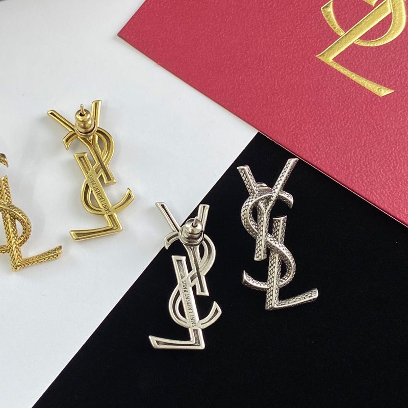 Saint Laurent Opyum Earrings In Snake Metal Silver