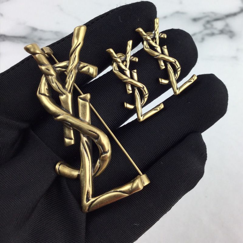 Saint Laurent Opyum Earrings In Vintage Metal Gold