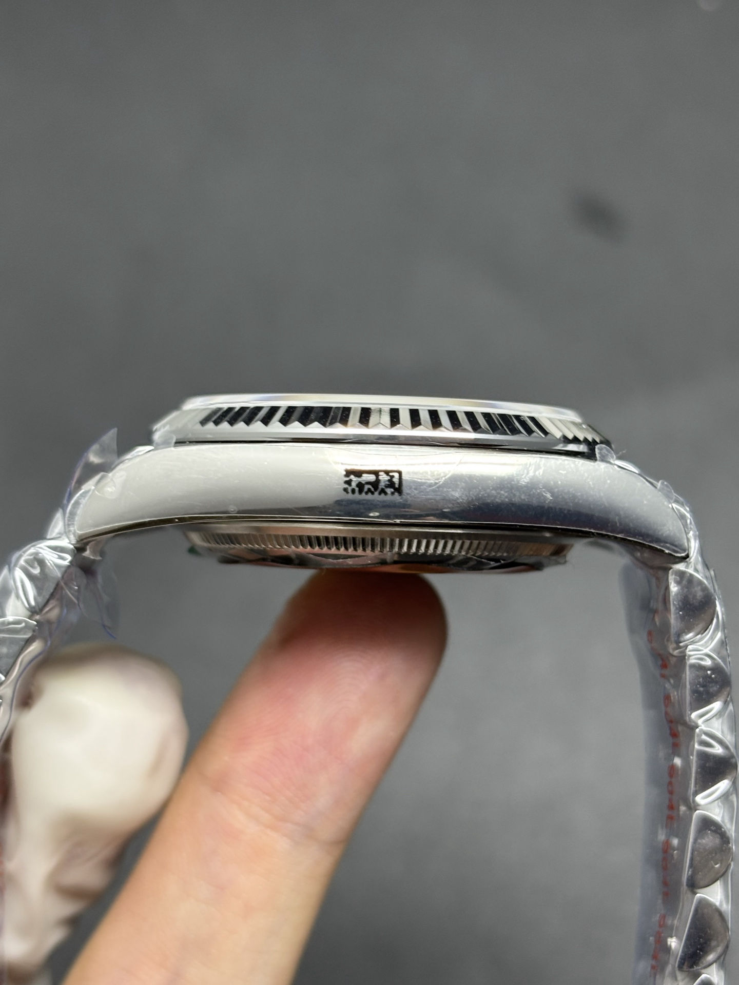 Rolex Day-Date Silver Dial and Fluted Bezel SunProtective 67