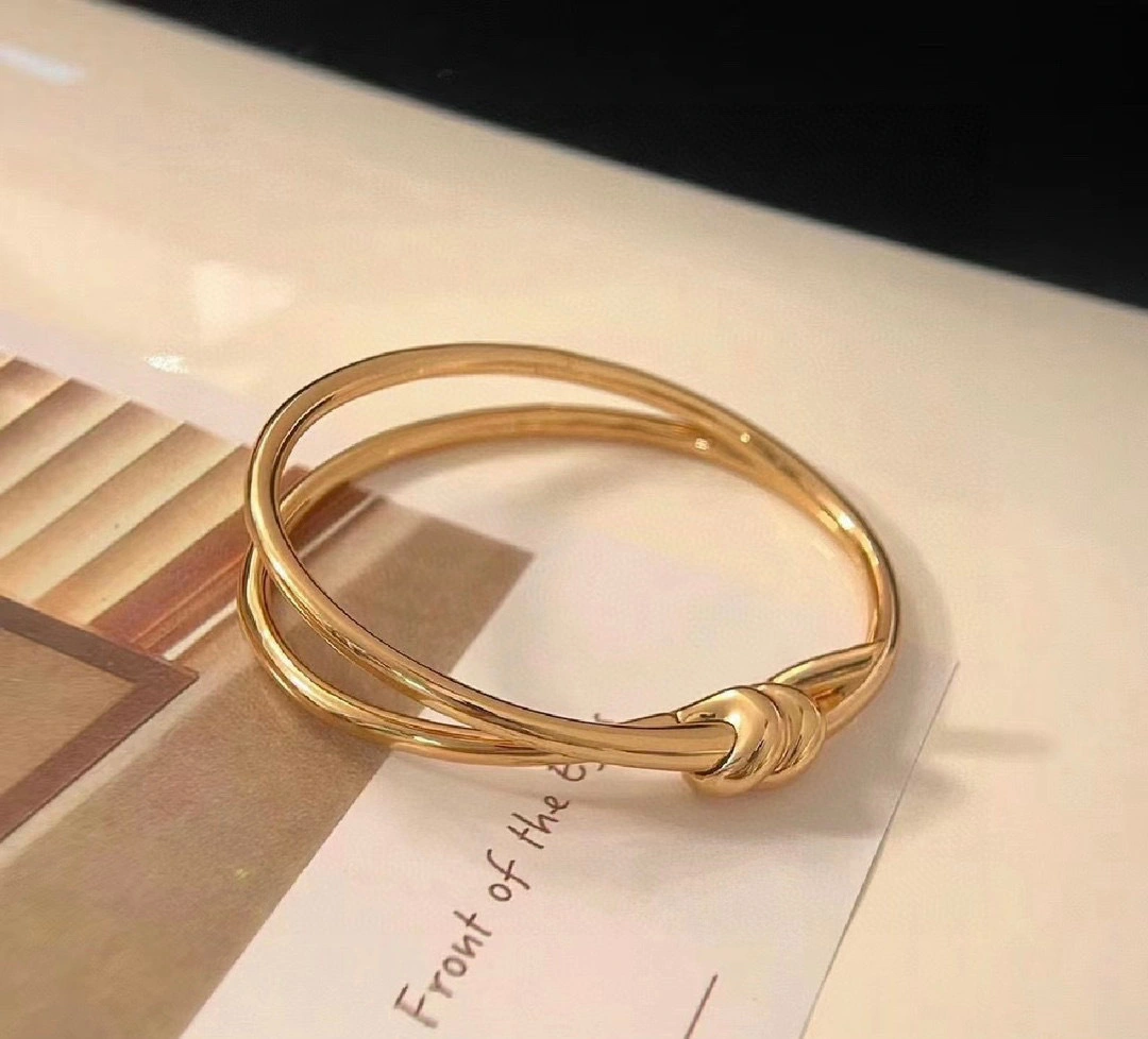 Barbara-- Tiff19y&3o bracelet 18 k gold 2colour item : E-S092J3115-2H