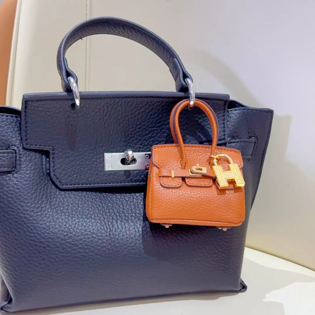 Hermes Key Holder And Bag Buckle Modern 7484