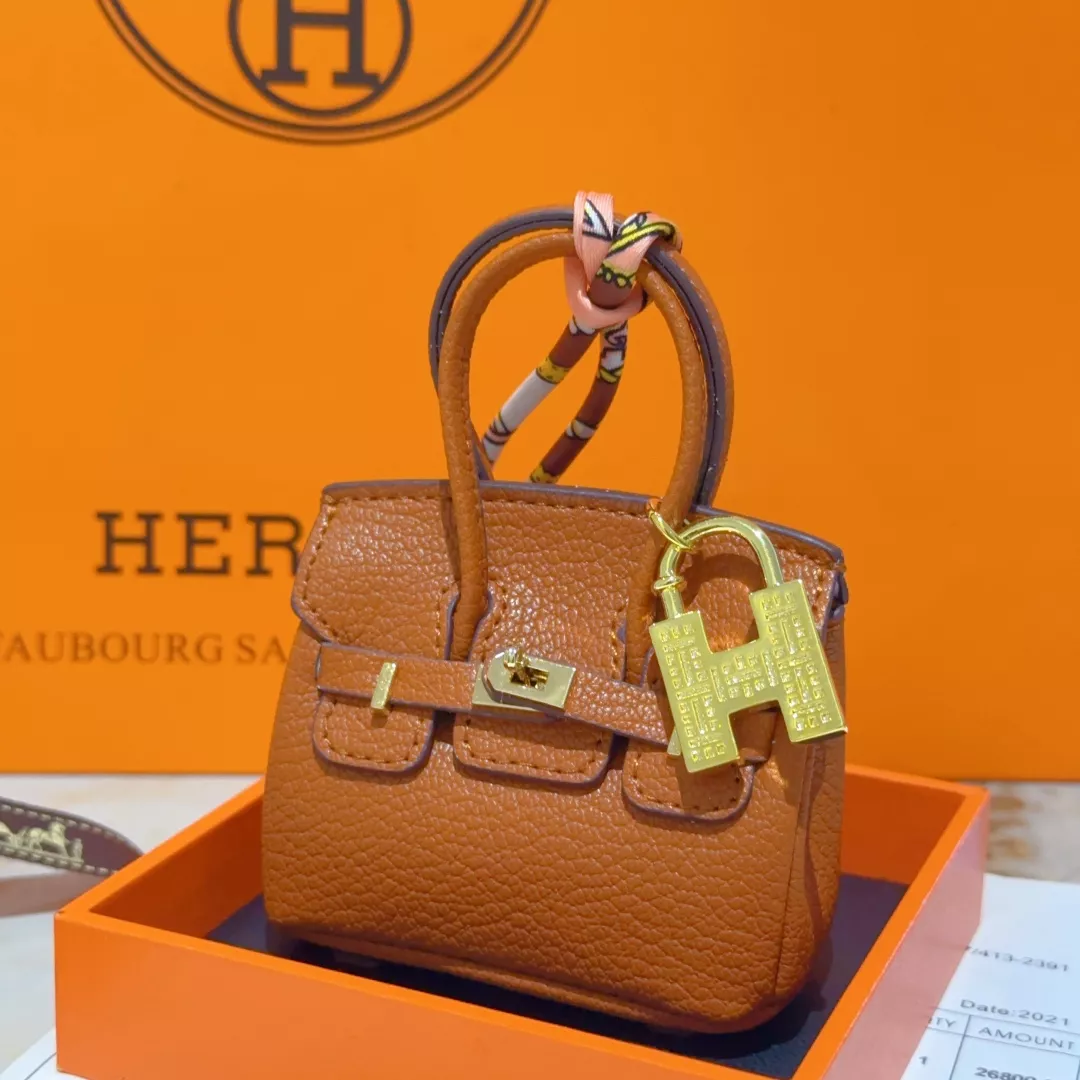 Hermes Key Holder And Bag Buckle Modern 7484