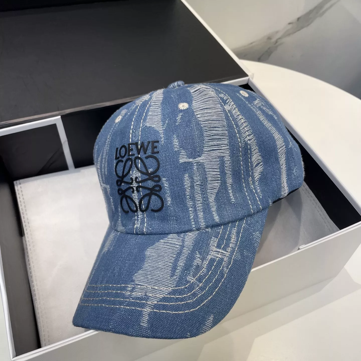 LOEWE Caps Modern 6055